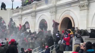 People tear gassed, throwing furniture at the cops