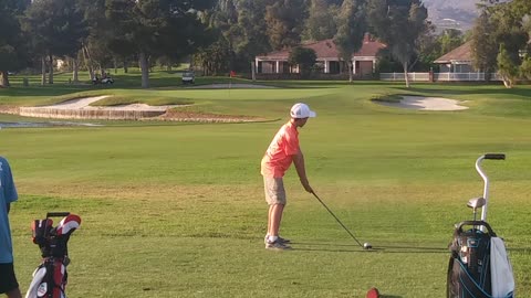 Golf Swing - on the green, by 9 years old Daniel