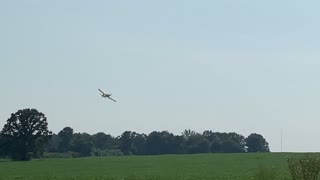 Yellow Crop-duster flying around