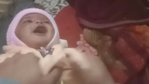 Little baby having fun with his father
