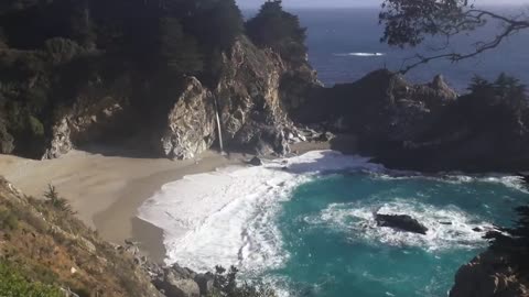 Unwind with this 3-hour video of a serene waterfall on a beach at sunset 🌅♥♥