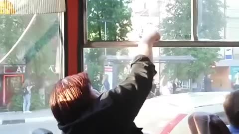 There was a silent dispute over a bus window