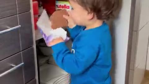 KID GETS A WAY WITH A CHOCOLATE