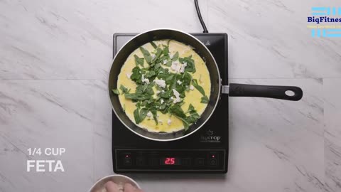 "Savor the Flavors of Feta and Spinach in Every Bite of These Omelets"