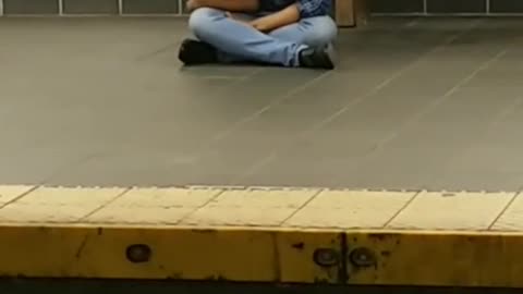 Blue flannel subway station sitting face down
