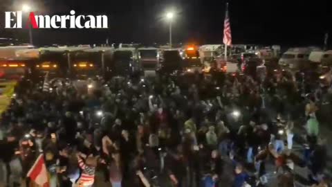 NOW: Thousands in attendance as people wave 50x150ft. American Flag in Indianapolis IN rally