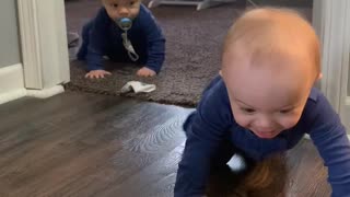 Twin Boys Learning to Crawl