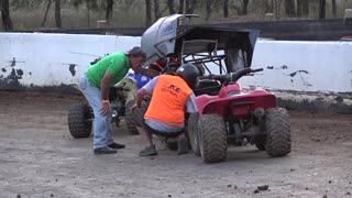 Driver Rolls in Outlaw Kart Race