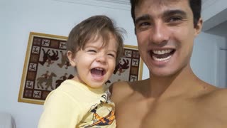 Father and Son Bond Over Laughter