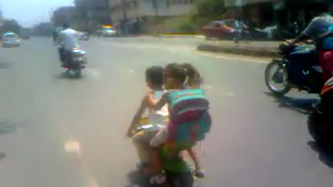 Kick 3..Small Kid Riding bike With his gf..Very funny.