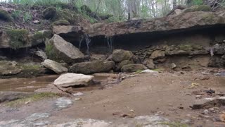 Trickling water fall over a slab sounds