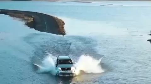 Want to drive across this flooded road in Iceland ???