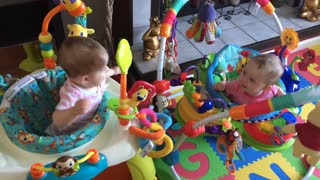 Twin babies communicate in adorable fashion