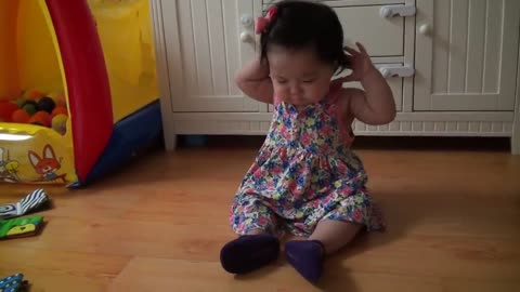 Cute baby wearing shoes for the first time! so sweet and funny