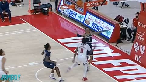 Unbelievable. Basketball player pukes on opponent.