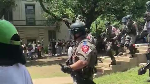 Texas State Troopers in full riot gear move in to clear the Hamas Sympathizers from the campus
