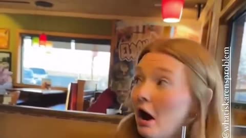 Woman Hissing At Waitress