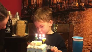 Kid Doesn't Understand Concept Of Blowing Out Birthday Candles