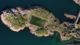 norway lofoten football field stadium in henningsvaer from above