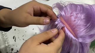 Sewing Hair Onto a Doll's Head