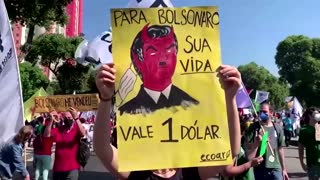 Brazilians protest Bolsonaro, slow vaccine rollout