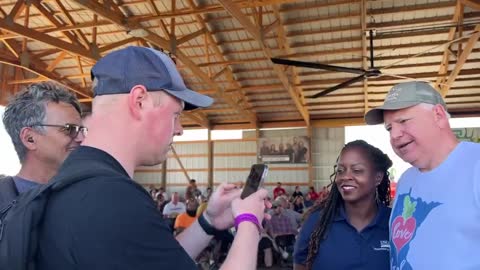 Farmfest attendee confronts Gov. Walz.