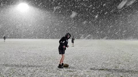 Rare Heavy Snowfall During Rugby Practice in Australia