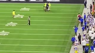 Fan Runs in Football Field, Gets Decked By Super Bowl Security