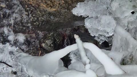 Icicles on a small river.