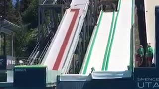 Collab copyright protection - guy slides down long waterslide