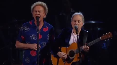 After Years Of Silence Between Them, Garfunkel Confronts Simon On Stage, And The Audience Erupts.