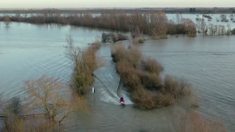Jet Skiers using the A1101 Welney on the Norfolk Cambridgeshire border after flooding
