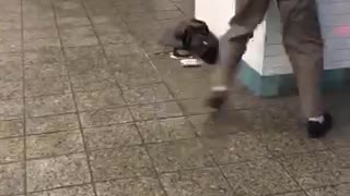 Old man dances in subway station