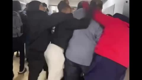 Minneapolis: More video angles from the brawl inside the school.