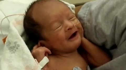 Preemie Baby Smiling and Giggling being held by Mom for the first time SO CUTE!