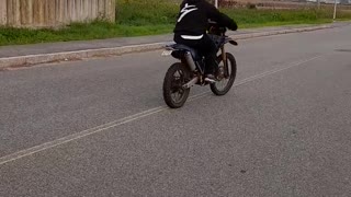 Tactical wheelie on a motorcycle