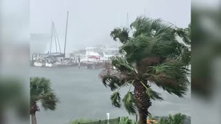 Waterspout whirls across Florida beach