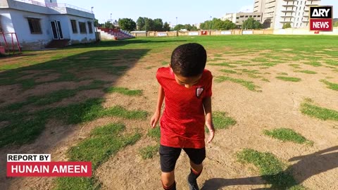 Adolescent Shams juggles school & labour to support football dream