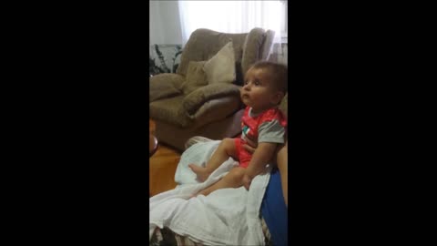 Metalhead baby falls asleep to daddy's "lullaby"