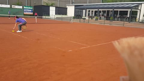 Girls playing tennis