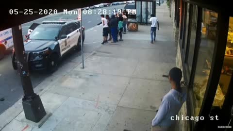 Bystanders Argue with Police Officers, Ambulance Arrives - Surveillance Video