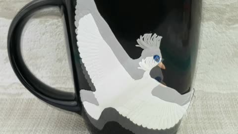 Cup decorated with Balinese starling. Handmade mug with a bird made of polymer clay by AnneAlArt