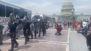 Riot Police Move To Protect SCOTUS