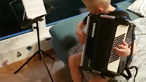 My little german cousin PLAYS accordion VERY WELL.