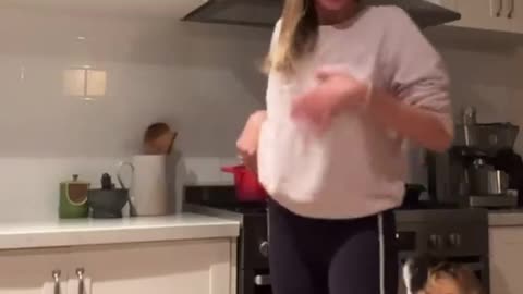 Dancing with Bulldog in Kitchen Leads to Unexpected Bite