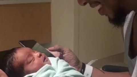 Newborn Baby Smiles When Dad Plays Music On Phone