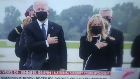 Joe Biden Checks His Watch During Service For Fallen Heroes