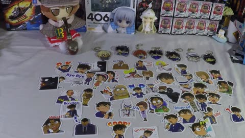 Temu Tuesday "Detective Anime keychains" and "50pcs Anime Series Detective Graffiti Stickers"