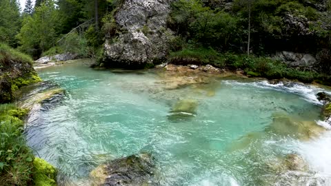River flowing through rocky rocks