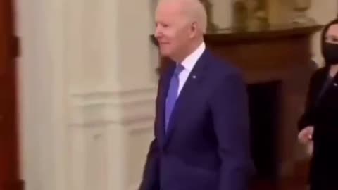 Bidan walking in the White House